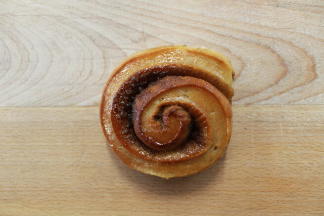A cardamom bun, a swirl with brown sugar and a light glaze.
