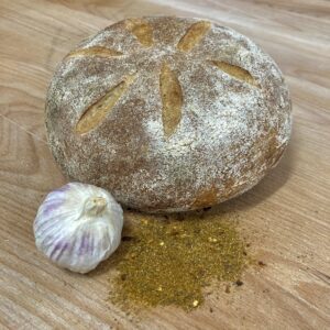 A loaf of bread flavoured with roasted garlic and harissa.